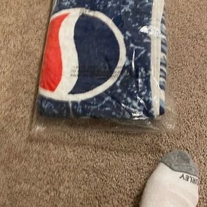 I am selling a Pepsi beach towel has the Pepsi emblem on towel